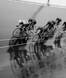 black and white image of cyclists keirin
