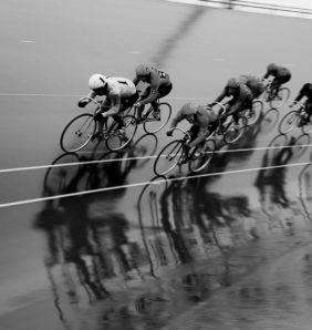 black and white image of cyclists keirin