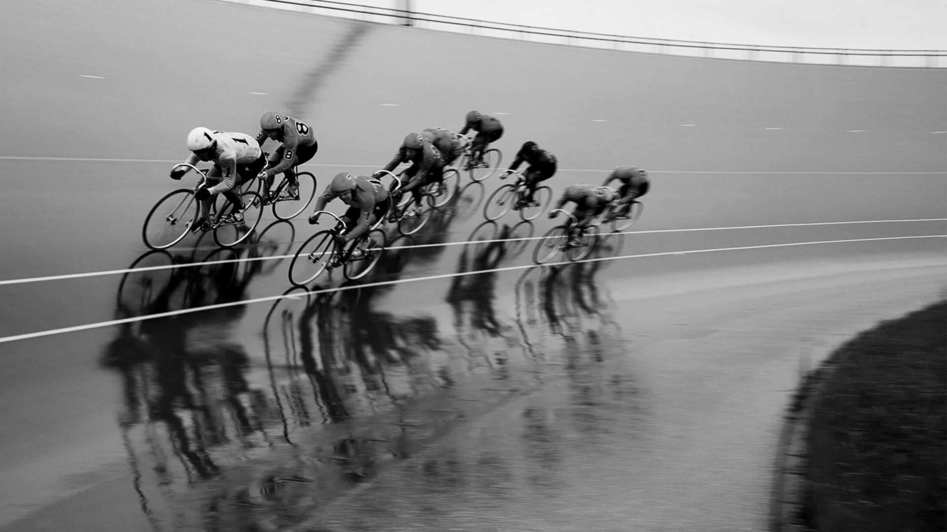 black and white image of cyclists keirin