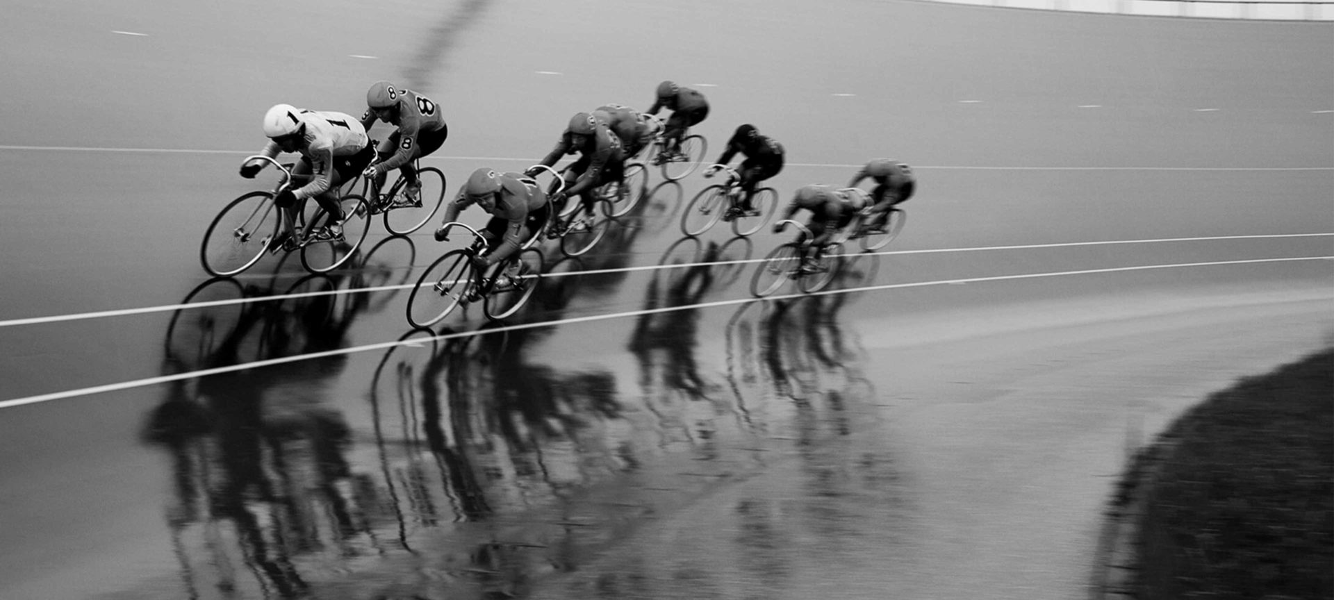 black and white image of cyclists keirin