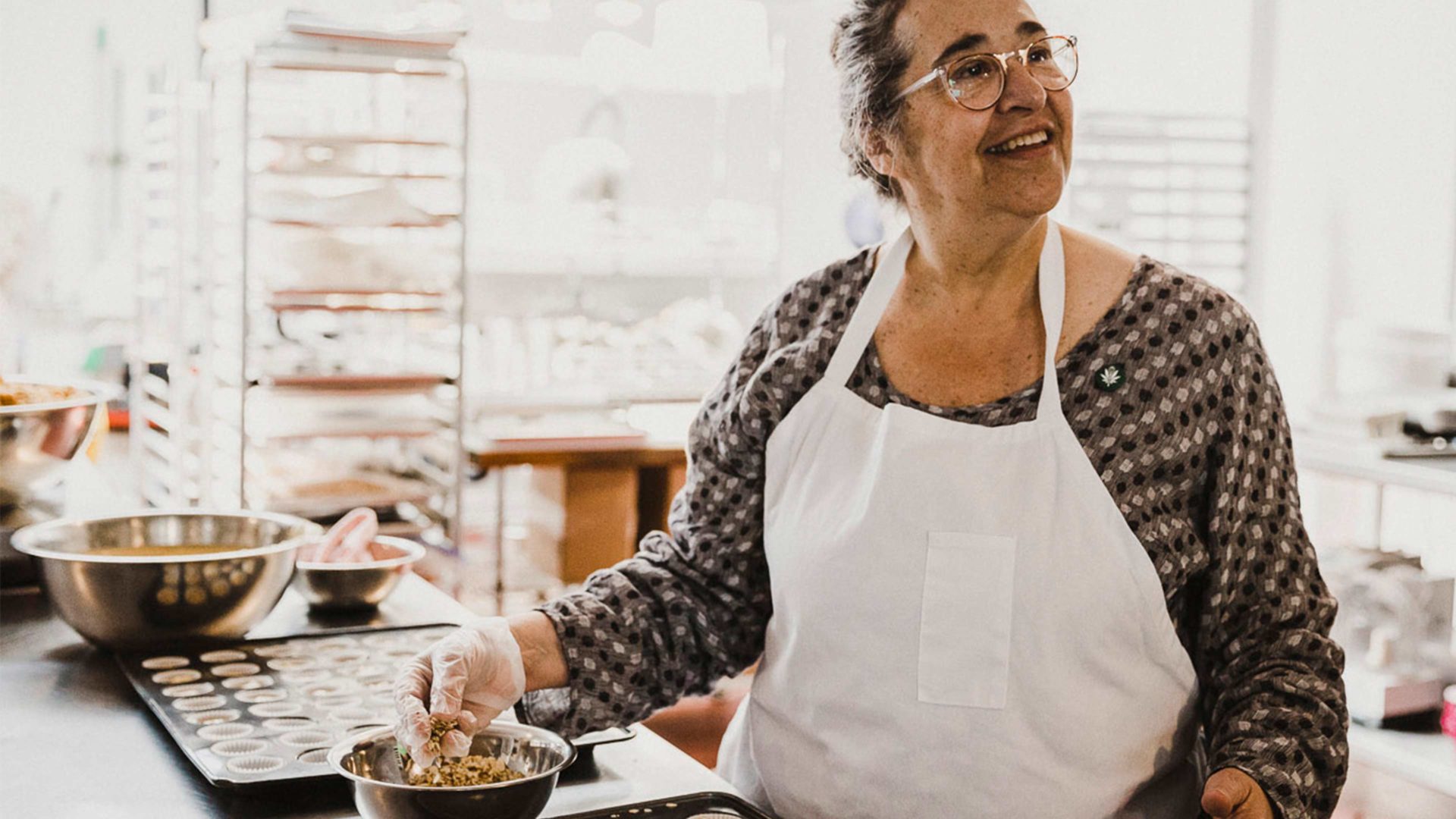 laurie wolf cooking edibles in a kitchen