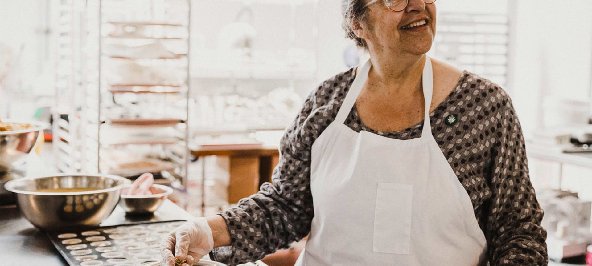 laurie wolf cooking edibles in a kitchen