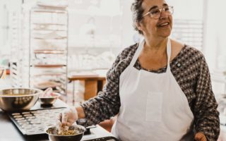 laurie wolf cooking edibles in a kitchen