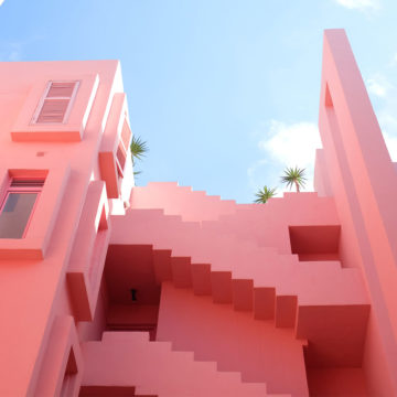 Pink buildings against a clear blue sky
