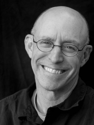 Michael Pollan smiling at camera