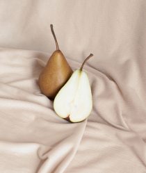 Pears nestled in a beige cloth