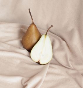 Pears nestled in a beige cloth