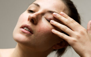 Model poses without makeup