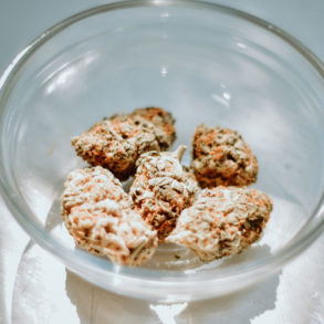 A few buds of kush in a clear bowl