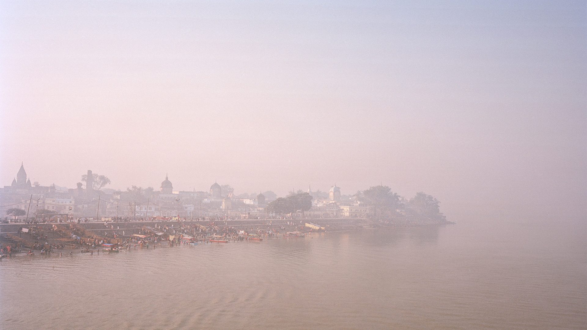 The river ganges at dusk tinted with a purple hue