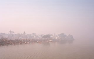 The river ganges at dusk tinted with a purple hue