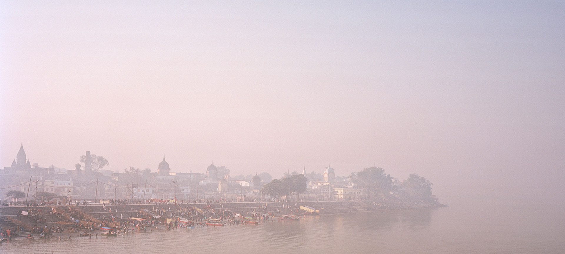 The river ganges at dusk tinted with a purple hue