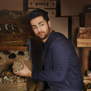 Fine food sourcer Ian Purkayastha sits in a van with crates of wine and truffles
