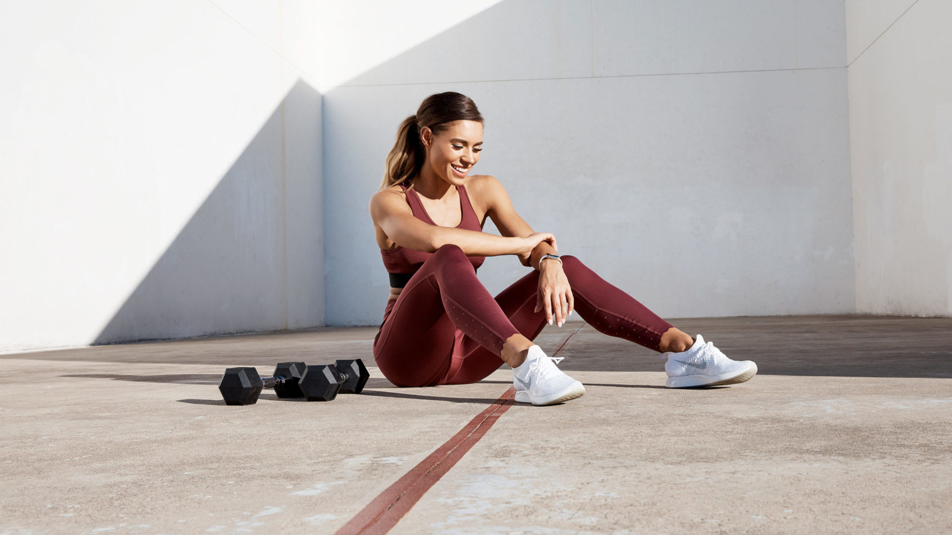 fitness influencer and sweat app trainer Kelsey Wells discusses body image and motherhood