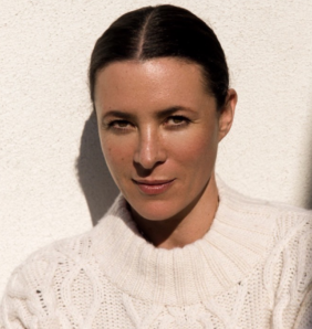 style influencer garance dore poses in white sweater