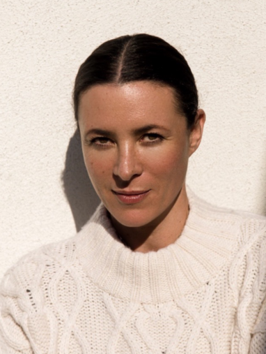 style influencer garance dore poses in white sweater
