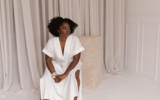 Interior designer Nike Onile poses in the studio