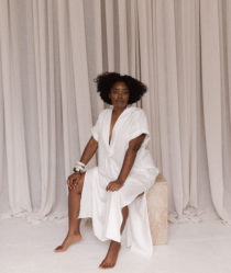 Interior designer Nike Onile poses in the studio