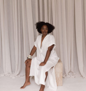 Interior designer Nike Onile poses in the studio