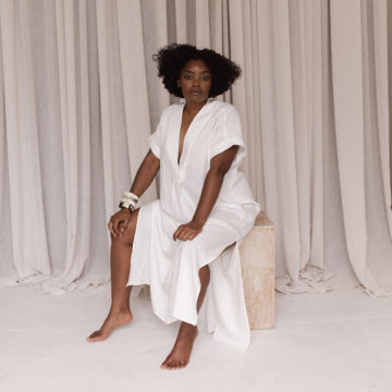 Interior designer Nike Onile poses in the studio