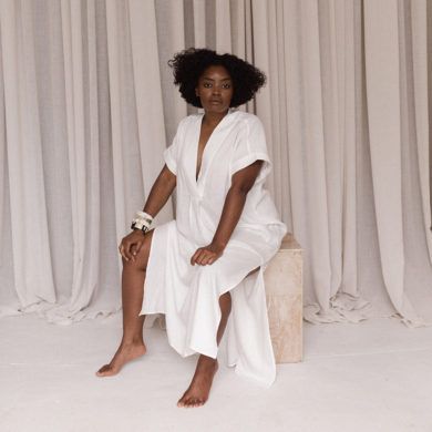 Interior designer Nike Onile poses in the studio